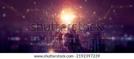 Businessman hand holding creative light bulb with industry network,analysis solution and development marketing network icons  planning strategy, Modern business, Innovative of new ideas.