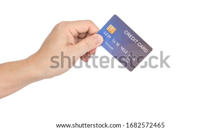 Businessman hand holding credit card isolated on white background.
Creditcard instead show of cash payment concept.