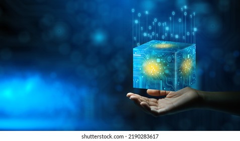 Businessman hand holding Cube technology with Abstract blue background. Blockchain Network System. Big data storage processing, Cloud data, Internet Security, and Digital Technology.