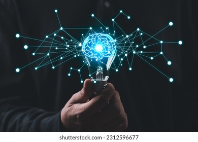 businessman Hand holding light bulb with brain glowing with blue light line and ray. Creative and new business knowledge thinking idea concept. - Powered by Shutterstock