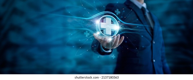 Businessman hand holding virtual medical health care icons with medical network connection. People health care awareness rising growth of medical health and life insurance business. - Shutterstock ID 2137180363