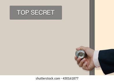 Businessman Hand Opening The Door Of Meeting Room With Label 