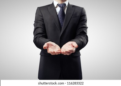 Businessman With Hand Outstretched Forward