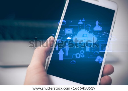 businessman hand pick with mobile phone and computer laptop in network connect concept, cloud storage icon, server ai system online, digital marketing, security of internet
