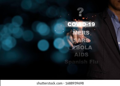 Businessman Hand Point COVID-19 Wording Among MERS SARS EBOLA AIDS And Spanish Flu On Black Background. It Is History Of Epidemic Plague In The World Which Effect To Economic Crisis.