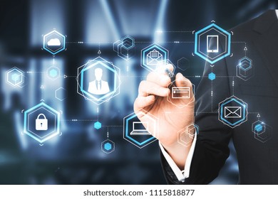 Businessman Hand Pointing At Digital Business Hologram On Blurry Office Interior Background. Finance, Blockchain And Future Concept. Double Exposure 