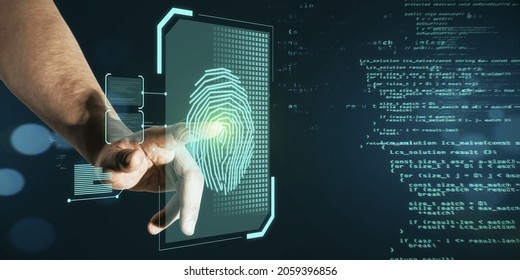Businessman hand pointing at glowing finger print interface on dark background with coding language. Security and biometrics concept