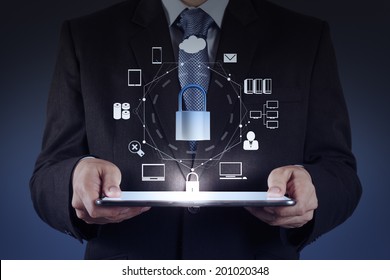 businessman hand pointing to padlock on touch screen computer as Internet security online business concept 