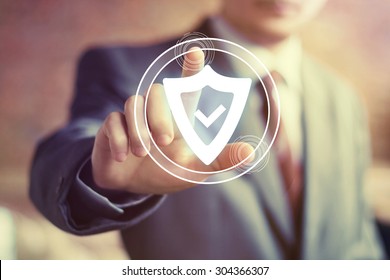 Businessman hand press shield security virus web button icon - Shutterstock ID 304366307