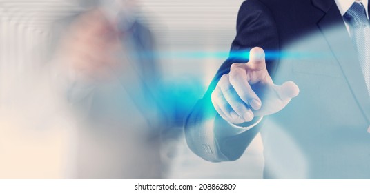 businessman hand pressing button with contact on virtual screens as concept 