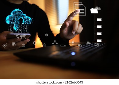 A Businessman Hand Reach Out To Touch Virtual Document In Folder To Manage A Hybrid Cloud System And Download Or Upload Data To Polygon Or Low Poly Cloud With Smartphone. Document Management Concept.