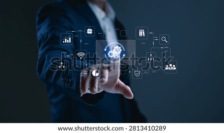 Businessman hand selecting virtual workflow automation interface representing business process management, digital transformation, workflow optimization, process automation and business solutions.