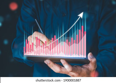 Businessman hand show Stock chart showing rising stock sign with graph indicator. Interest rate financial and mortgage rates concept. Double Exposure Image.