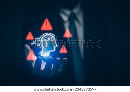 Businessman hand showing warning about use of intelligent technology (Ai), access to malicious software or cybersecurity on computers. concept security technology and protection of information.