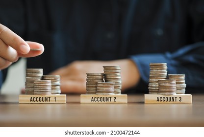 Businessman Hand Stacking Coins For Finance Investment Management By Portfolio Diversification For Distributing Risks And Increasing Opportunities