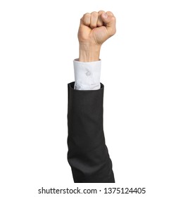 Businessman Hand In Suit Showing Clenched Fist Gesture. Victory Or Protest Sign. Human Hand Gesturing Sign Isolated On White Background. Businessman Raised Arm Presenting Popular Gesture.