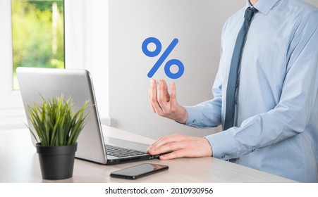 Businessman Hand Takes A Percentage Symbol Icon. Interest Rate Financial And Mortgage Rates Concept