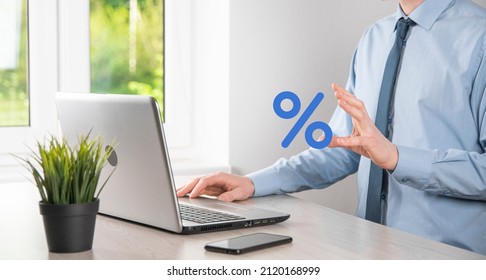 Businessman Hand Takes A Percentage Symbol Icon. Interest Rate Financial And Mortgage Rates Concept