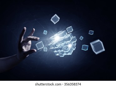 Businessman hand touch cube as symbol of problem solving  - Shutterstock ID 356358374