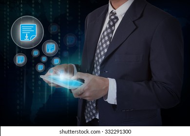 Businessman Hand Touch Screen Pdf Icons On A Tablet. Internet And Technology Concept.