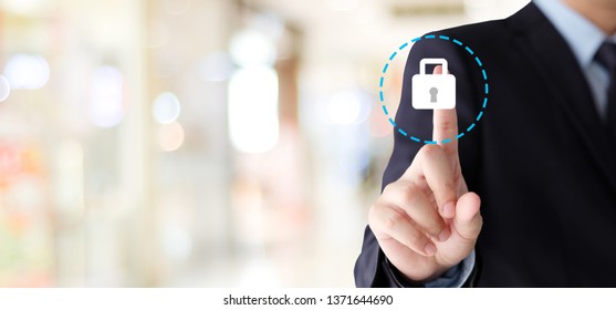 Businessman Hand Touching  Cyber Security Icon Over Blur Background With Copy Space,business And Technology Background, Banner