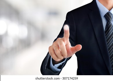 Businessman Hand Touching Empty Virtual Screen, Modern Business Background Concept - Can Be Used For Montage Your Text Or Pictures At The Finger