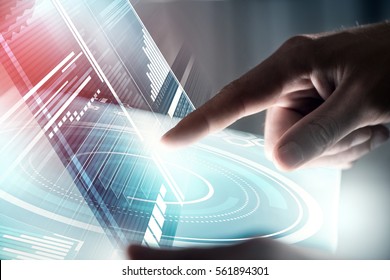 Businessman hand touching with finger virtual panel with infographs