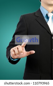businessman hand touching growth button - Shutterstock ID 110793965
