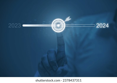 Businessman Hand touching on download bar status to change from 2023 to 2024 in change and start new and happy new year by technology concept, Start new business and new life

 - Powered by Shutterstock - Get 15% off with code: PIKWIZARD15