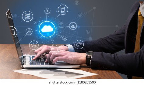 Businessman Hand Typing With Cloud Technology System And Office Symbol Concept