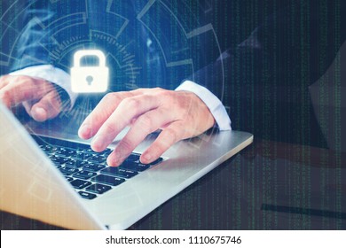 Businessman hand using laptop with Cyber security job business and  network server concept