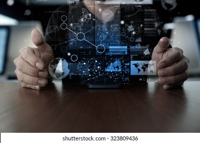 Businessman hand using mobile phone with digital layer effect as business strategy concept                  - Shutterstock ID 323809436