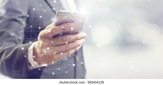 Businessman Hand Using Mobile Phone And Dots Online Communication Network, Copy Space