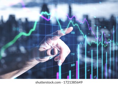 Businessman hand using recession stock chart on screen interface with index. Trade and finance concept. Double exposure