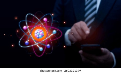 Businessman hand using smartphone with abstract glowing atom molecule hologram. Nuclear fusion concept, Endless energy, Cheap electricity, Future technologies. Science, Power and Innovation concept