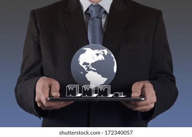 businessman hand using tablet computer and www.as internet concept