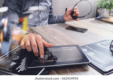 Businessman Hand Using VOIP Headset With Digital Tablet Computer,document,concept Communication, It Support, Call Center And Customer Service Help Desk,filter Effect

