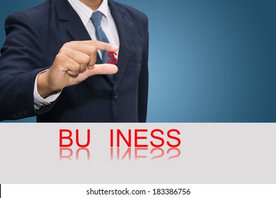 Businessman hand and word Business concept. 