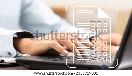 Businessman hand work with laptop and mark in checkbox for review performance of leader in office, performance evaluation concept