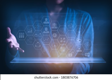 businessman hand working analytics and business intelligence with graph on a digital screen interface with virtual icon diagram.