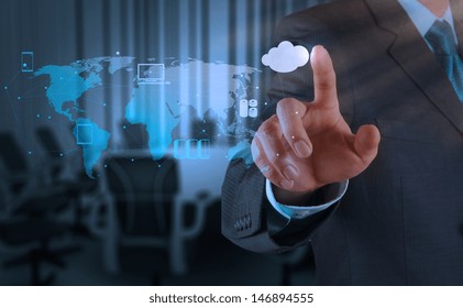 Businessman hand working with a Cloud Computing diagram on the new computer interface as concept