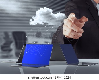 Businessman hand working with a Cloud Computing diagram on the new computer interface as concept