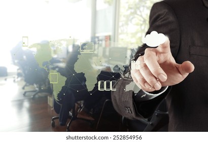 Businessman hand working with a Cloud Computing diagram on the new computer interface as concept