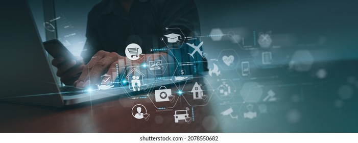 Businessman hand working with modern computer and smart phone show vitual innovation insurance online for car, travel, family and life, financial and health insurance. Insurance concept. - Shutterstock ID 2078550682