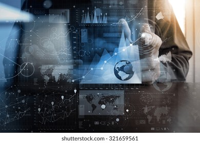 Businessman Hand Working With Modern Technology And Digital Layer Effect As Business Strategy Concept