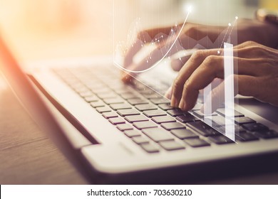 businessman hand working with new modern computer and business strategy as concept  / soft focus picture / Vintage concept - Shutterstock ID 703630210