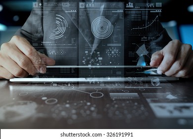 businessman hand working on laptop computer with digital layer business strategy and social media diagram on wooden desk  