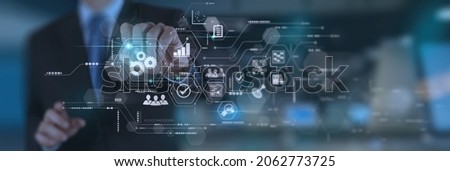 Businessman hand working with virtual innovation Operations management involving business process and problem solving,workflow,monitoring and innovation,high quality control on computer dashboard.