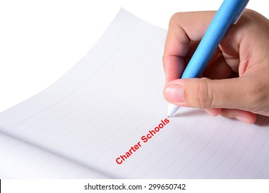 Businessman Hand Write A Charter Schools