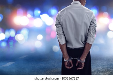 Businessman In Handcuffs